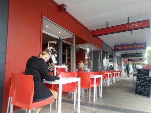 Tiff outside one of the many cafes in Coffs Harbour
