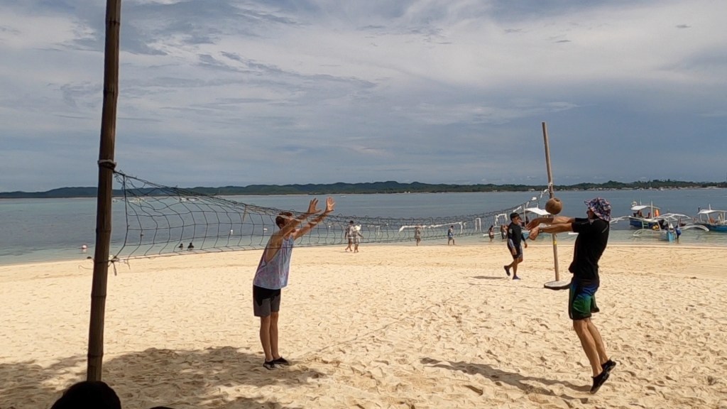 A volleyball match with a coconut